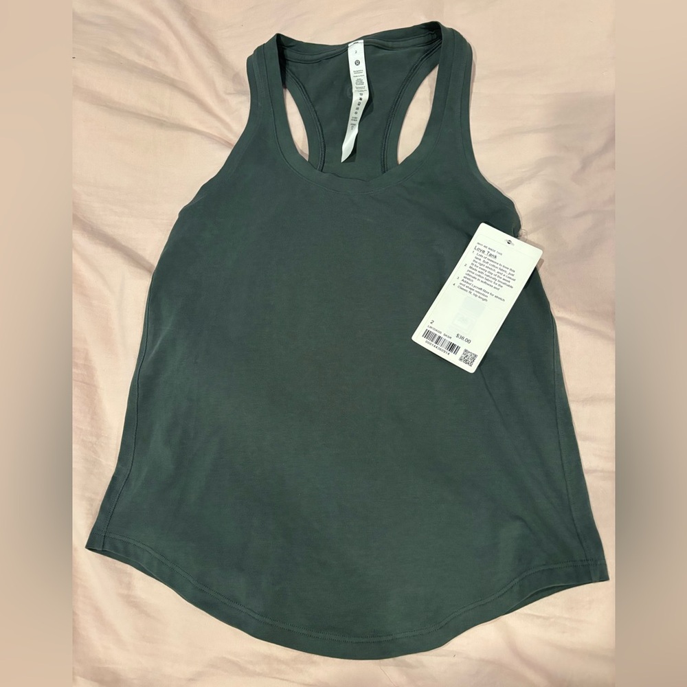 Lululemon dark green "Love" tank, brand new with tags